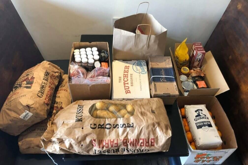 A variety of pantry foods like flour, oats, and spices.